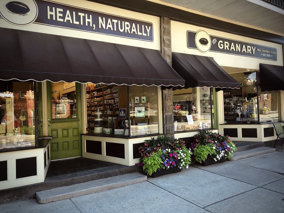 Sidewalk view of The Granary storefront in downtown Carleton Place, Ontario, featuring the store signage.