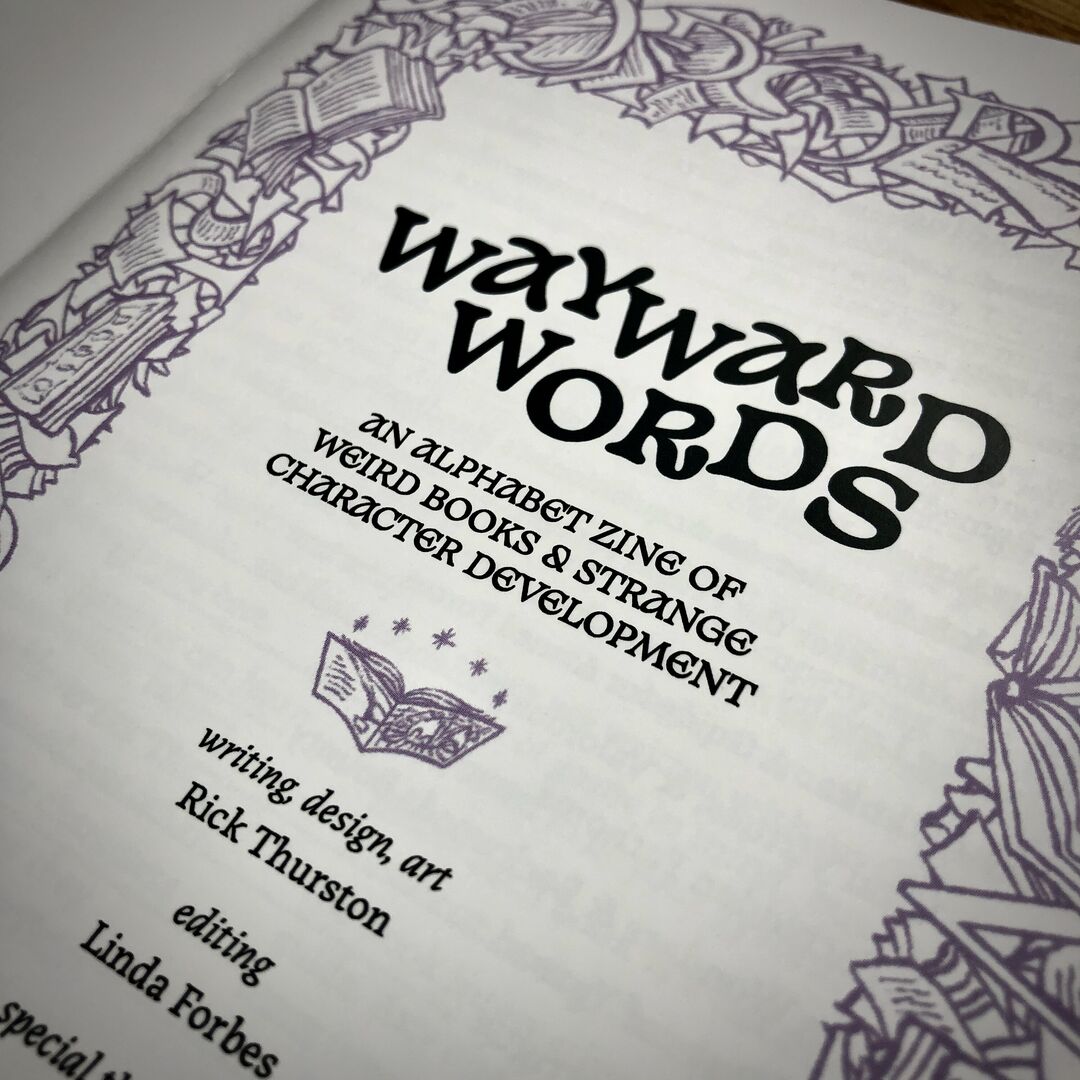 Inside title page of "Wayward Words" zine with decorative art border of alphabet letters intermixed with flying books and paper. Subtitle reads, An alphabet zine of weird books and strange character development